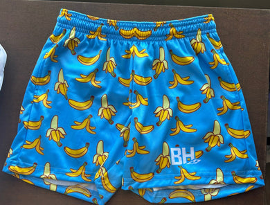 Go bananas on and off the field! These wild blue shorts are covered in playful banana prints for serious fun and fruity flair. Rock 'em when you're peeling out past the competition!

